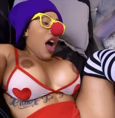 Clowning around with a thick latina